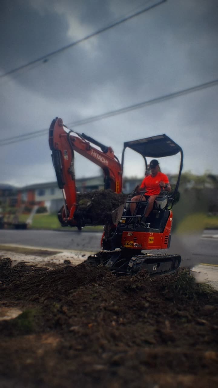 Ronin digging out a site with a mini excavator